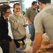 University of Michigan seniors Rachel Meyers, of Grand Rapids, left, and Natalie Smith, of New Jersey, check out the bread selections from Great Harvest Bread Company during the MFarmers' Market set up outside of the Duderstadt Center on Thursday. Melanie Maxwell I AnnArbor.com